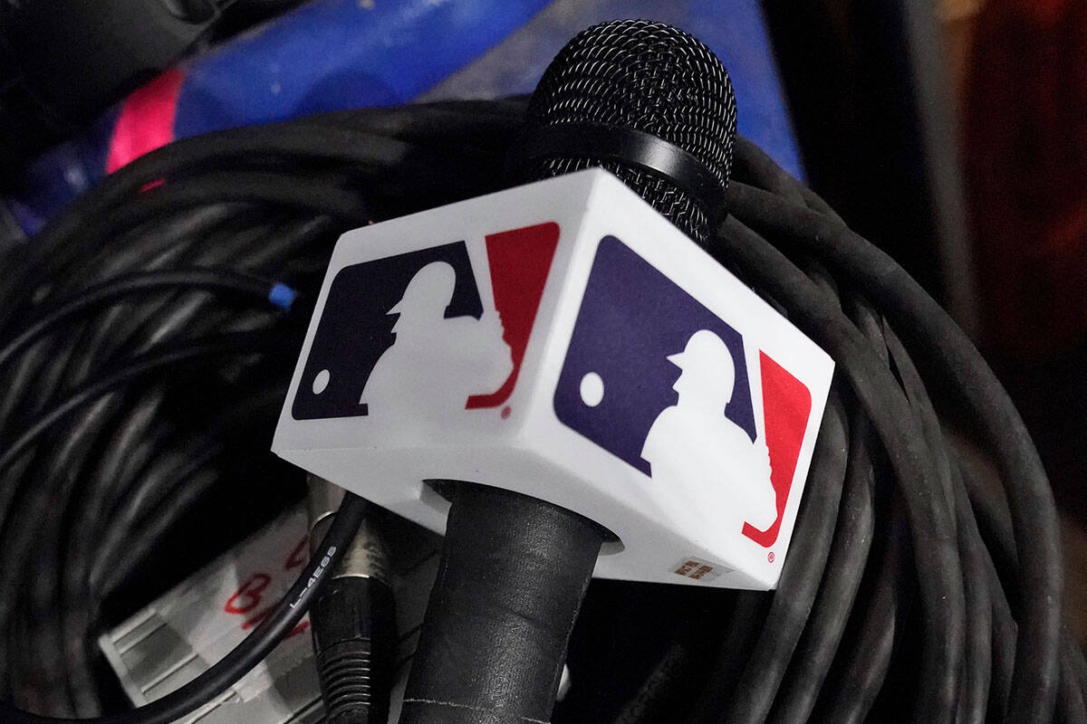 A microphone belonging to a field reporter for the San Diego Padres sits on top of audio cables ...