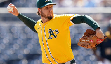 FILE - Athletics pitcher Mitch Spence delivers during the first inning of a baseball game again ...