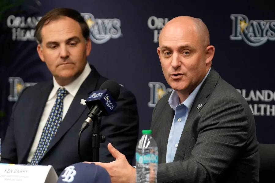 New Tampa Bay Rays ownership chief executive officer Ken Babby, right, speaks to the media as managing partner and co-chair Patrick Zalupski, looks on during an introductory baseball news conference, Tuesday, Oct. 7, 2025, in Tampa, Fla. (AP Photo/Chris O’Meara)