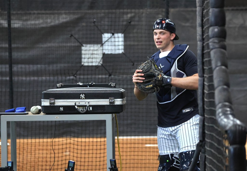 New York Yankees catcher Ben Rice #22 in the bullpen.