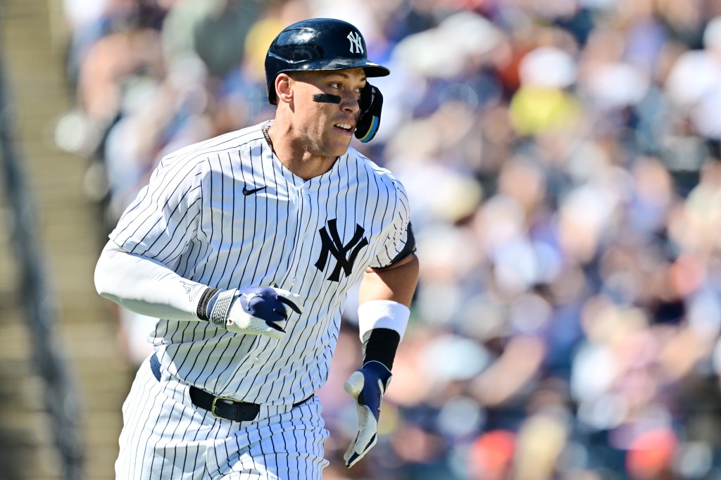 TAMPA, FLORIDA - FEBRUARY 21: Aaron Judge #99 of the New York Yankees runs the bases after hitting a two-run home run in the third inning against the Detroit Tigers during a Grapefruit League spring training game at George M. Steinbrenner Field on February 21, 2026 in Tampa, Florida. (Photo by Julio Aguilar/Getty Images)