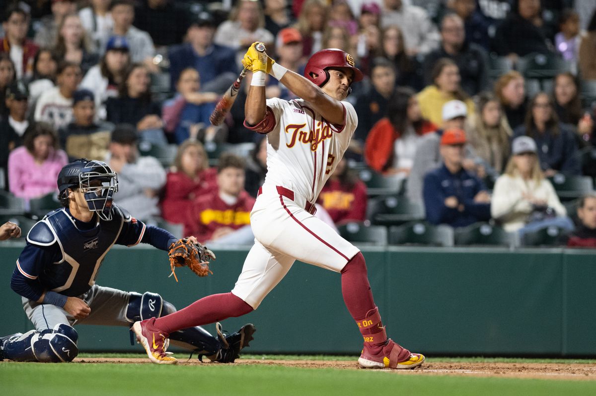 USC Trojan catcher Augie Lopez (5) makes a base hit during an NCAA Men's baseball game between the USC Trojans and Pepperdine Wave Friday February 13,2026 at Dedeaux Field in Los Angeles Calif USC Trojan catcher Augie Lopez (5) makes a base hit during an NCAA Men's baseball game between the USC Trojans and Pepperdine Wave Friday February 13,2026 at Dedeaux Field in Los Angeles Calif