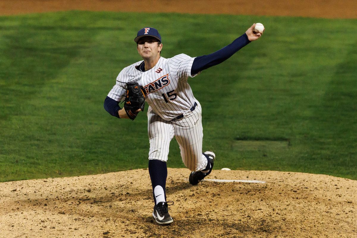 CSUF Titans pitcher Andrew Wright (15) pitches during an NCAA Baseball game against the CBU Lancers on February 13, 2026 in Fullerton, California.