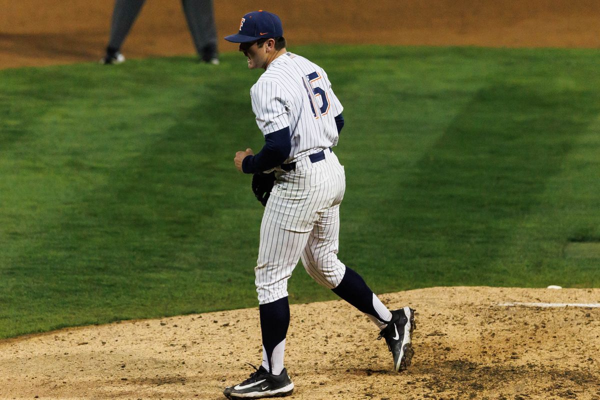CSUF Titans pitcher Andrew Wright (15) celebrates after an inning-ending strikeout during an NCAA Baseball game against the CBU Lancers on February 13, 2026 in Fullerton, California.