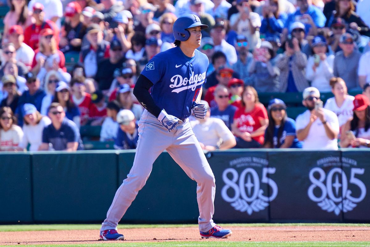 The Los Angeles Dodgers two way player Shohei Ohtani (17) leads off at first against the Los Angeles Angels, February 21st, 2026 in Tempe Arizona.