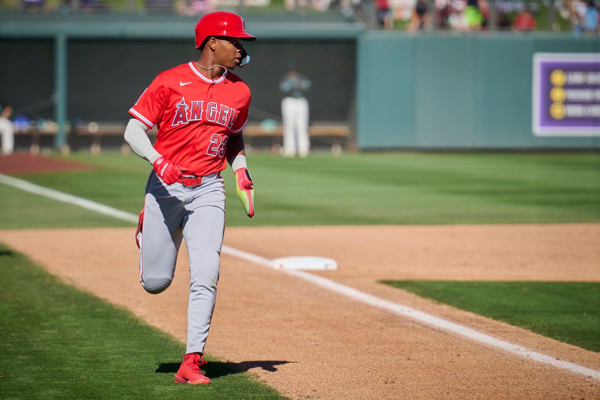 The Los Angeles Angels infielder Denzer Guzman (23) scores a run against The Arizona Diamondbacks ,February 22nd, 2026 in Scottsdale Arizona. The Los Angeles Angels infielder Denzer Guzman (23) scores a run against The Arizona Diamondbacks ,February 22nd, 2026 in Scottsdale Arizona.