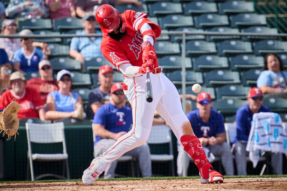 The Los Angeles Angels left fielder Jo Adell (7) gets a single against The Texas Rangers ,February 23rd, 2026 in Tempe  Arizona.
