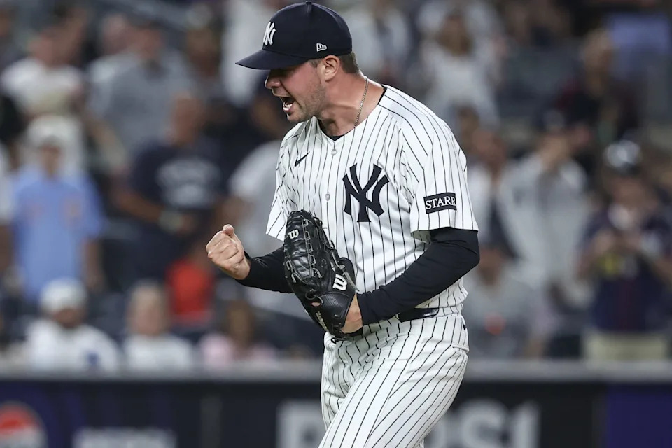 New York Yankees relief pitcher Scott Effross (57) reacts after defeating the Chicago Cubs 11-0 at Yankee Stadium in New York on July 11, 2025.