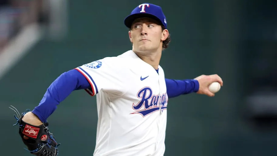Texas Rangers relief pitcher Jacob Latz throws a pitch.