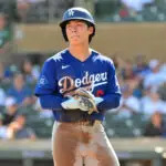 Los Angeles Dodgers second baseman Hyeseong Kim (6) looks on in the first inning against the Arizona Diamondbacks at Salt River Fields at Talking Stick.