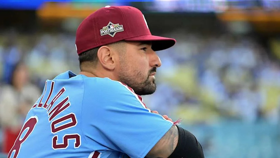Nick Castellanos of Philadelphia Phillies watches from dugout