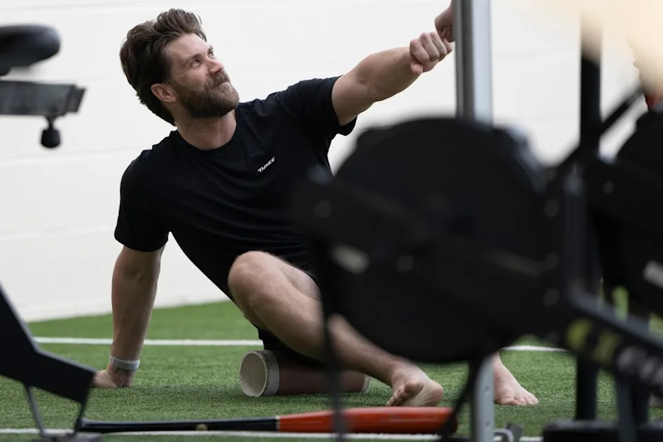 Bryce Harper of the Philadelphia Phillies fist-bumps teammates Sunday, Feb. 15, 2026. AP