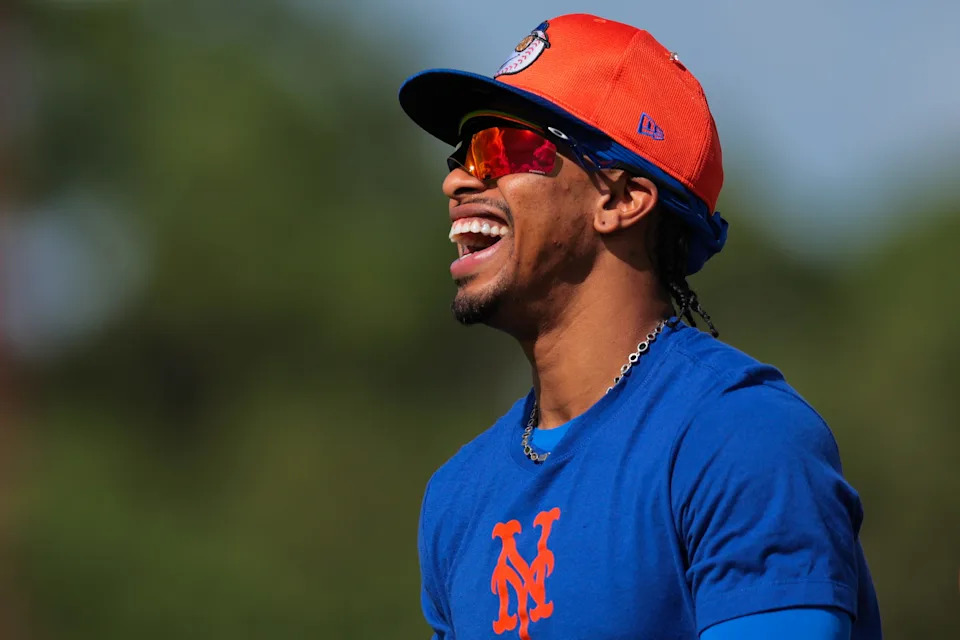 Feb 15, 2025; Port St. Lucie, FL, USA; New York Mets shortstop Francisco Lindor (12) reacts during a spring training workout at Clover Park. Mandatory Credit: Sam Navarro-Imagn Images