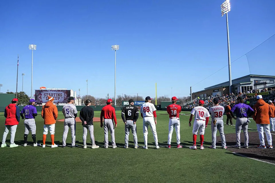 Texas Longhorns baseball alumni line up on the field ahead of the annual Texas Longhorns Alumni Baseball Game at UFCU Disch-Falk Field on Saturday, Jan. 31, 2026 in Austin. (Aaron E. Martinez/Austin American-Statesman)
