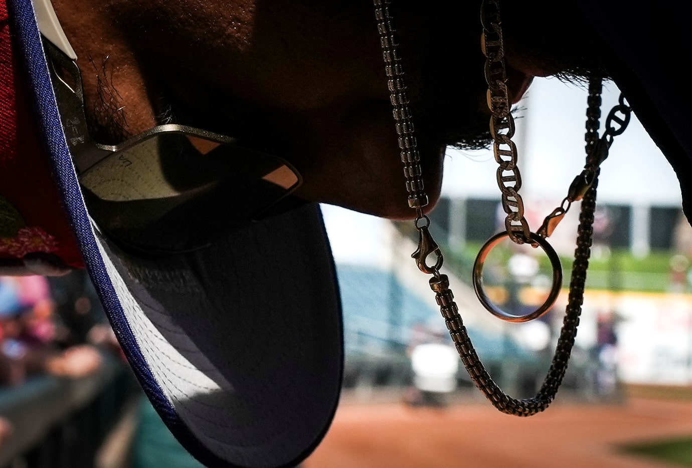 Texas Rangers infielder Ezequiel Duran signs autographs before a spring training game...