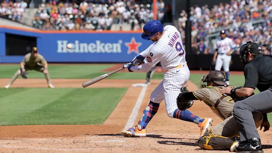 New York Mets Brandon Nimmo swinging a baseball ba