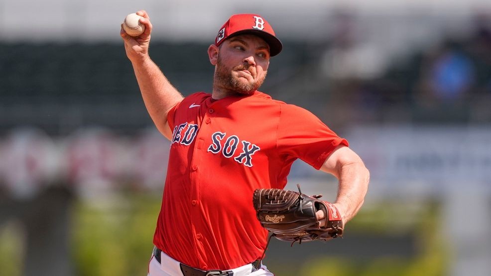 FILE - Boston Red Sox pitcher Liam Hendriks delivers in the fourth inning of a spring training baseball game against the Tampa Bay Rays in Fort Myers, Fla., Feb. 26, 2025. (AP Photo/Gerald Herbert, File)
