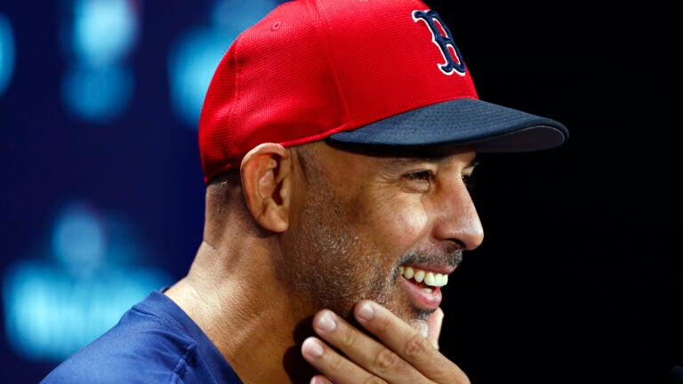 Boston Red Sox manager Alex Cora (13) smiles during a press conference before Game 2 of the Wild Card playoff series at Yankee Stadium on Oct. 1, 2025, in New York.
