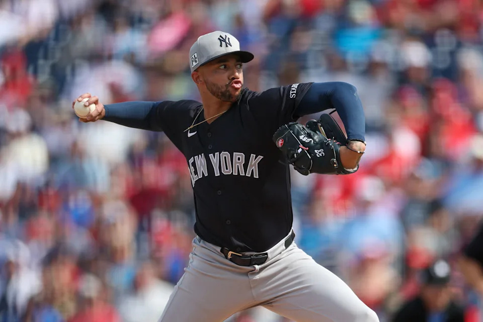 Mar 4, 2025; Clearwater, Florida, USA; New York Yankees pitcher Devin Williams (38) throws a pitch against the Philadelphia Phillies in the fourth inning during spring training at BayCare Ballpark. Mandatory Credit: Nathan Ray Seebeck-Imagn Images