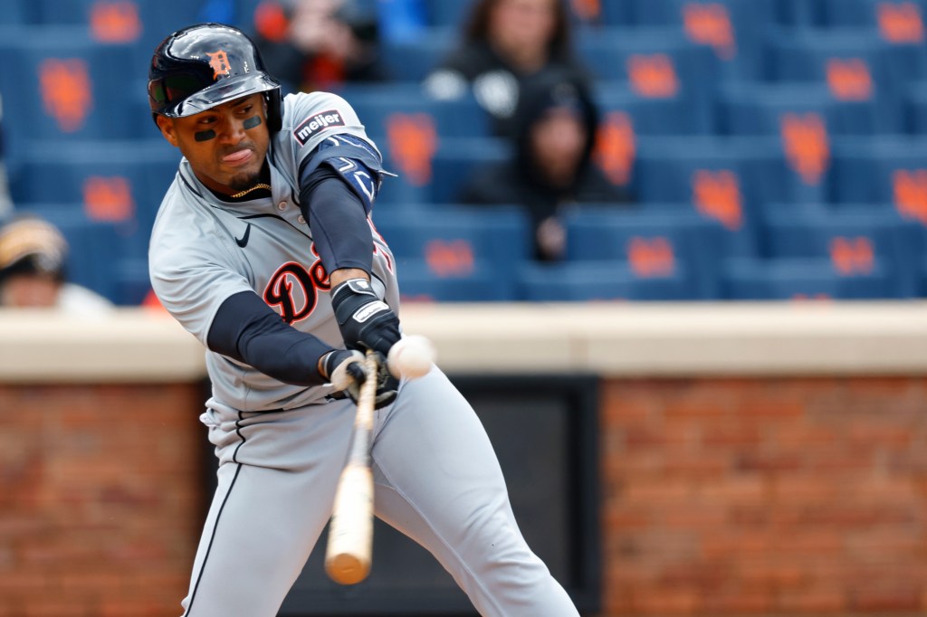 Andy Ibanez hitting a sacrifice fly for the Detroit Tigers.