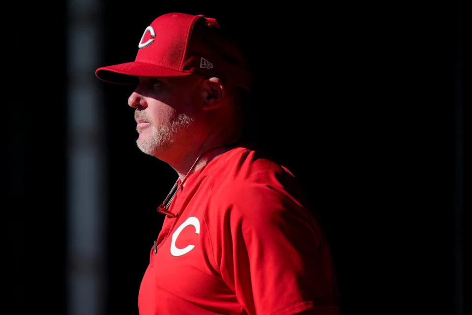 Cincinnati Reds pitching coach/director of pitching Derek Johnson (36) watches a bullpen session at the Cincinnati Reds player development complex in Goodyear, Ariz., on Saturday, Feb. 14, 2026.