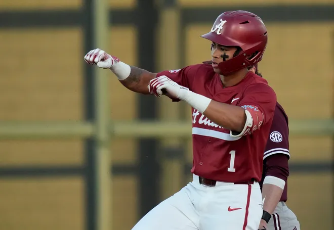 Alabama shortstop Justin Lebron (1) celebrates a double during the game with Mississippi State at Sewell-Thomas Stadium in Tuscaloosa Friday, April 11, 2025.