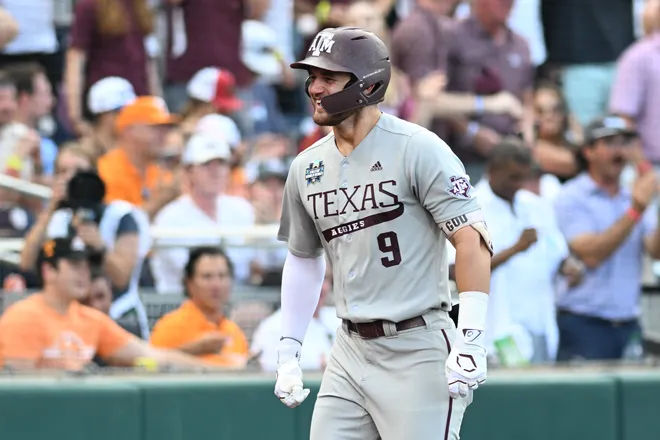 Jun 22, 2024; Omaha, NE, USA; Texas A&M Aggies third baseman Gavin Grahovac (9) celebrates after hitting a home run against the Tennessee Volunteers during the first inning at Charles Schwab Field Omaha. Mandatory Credit: Steven Branscombe-USA TODAY Sports