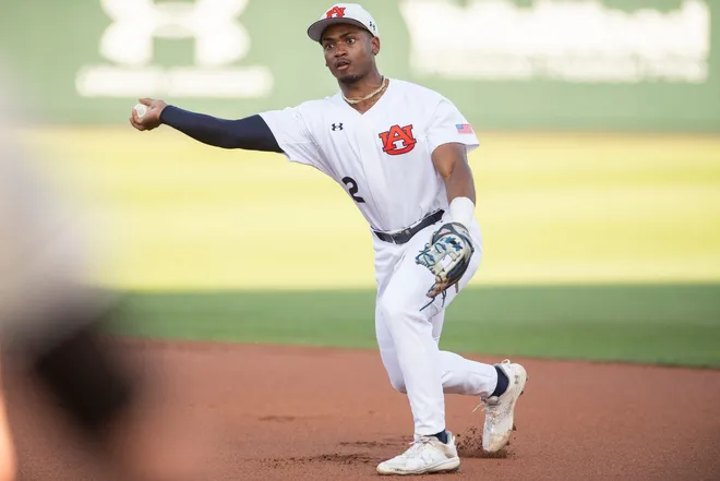 Auburn Tigers' Chris Rembert (2) throws the ball to first base as the Auburn Tigers take on South Carolina Gamecocks at Plainsman Park in Auburn, Ala., on Thursday, May 8, 2025.