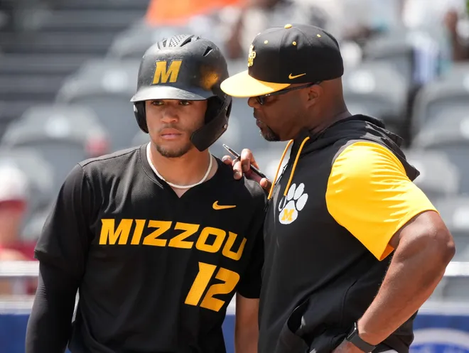 May 20, 2025; Hoover, AL, USA; Missouri hitter Tyler Macon confers with coach Kerrick Jackson during the game with Alabama in the first game of the SEC Baseball Tournament at the Hoover Met.