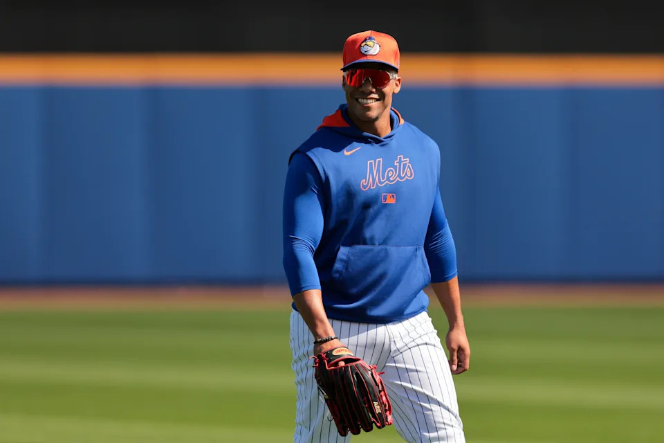 Feb 17, 2025; Port St. Lucie, FL, USA; New York Mets right fielder Juan Soto (22) reacts during a spring training workout at Clover Park. Mandatory Credit: Sam Navarro-Imagn Images
