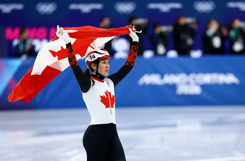 Milano Cortina 2026 Olympics - Short Track Speed Skating - Women's 1000m - Finals - Milano Ice Skating Arena, Milan, Italy - February 16, 2026. Courtney Sarault of Canada celebrates after winning silver medal in final A REUTERS/Yves Herman