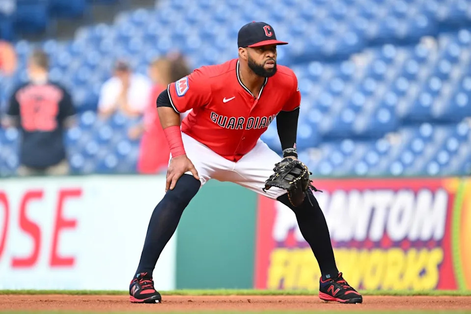 First baseman Carlos Santana of the Cleveland Guardians hops into his ready stance during the first inning against the Tampa Bay Rays at Progressive Field on August 25, 2025 in Cleveland, Ohio. Getty Images