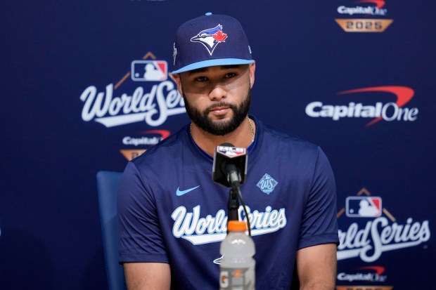 Toronto Blue Jays' Isiah Kiner-Falefa speaks prior to Game 4 of baseball's World Series against the Los Angeles Dodgers, Tuesday, Oct. 28, 2025, in Los Angeles. (AP Photo/Ashley Landis)