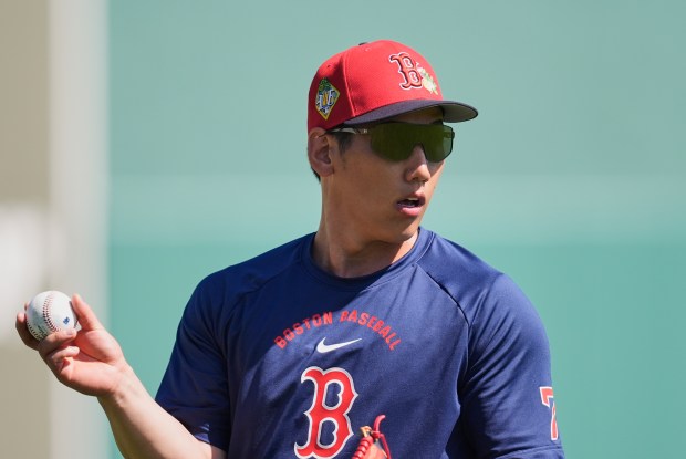 Boston Red Sox outfielder Masataka Yoshida goes through drills during a spring training baseball workout in Fort Myers, Fla., Monday, Feb. 16, 2026. (AP Photo/Gerald Herbert)