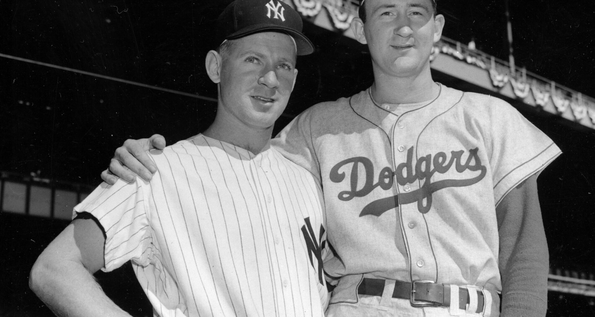 Opposing pitchers Whitey Ford, New York Yankees, and Roger Craig, Brooklyn Dodgers, pose before third World Series game at Yankee Stadium in New York, Oct. 6, 1956. The Dodgers have won the first two games in the Series. Photo: AP