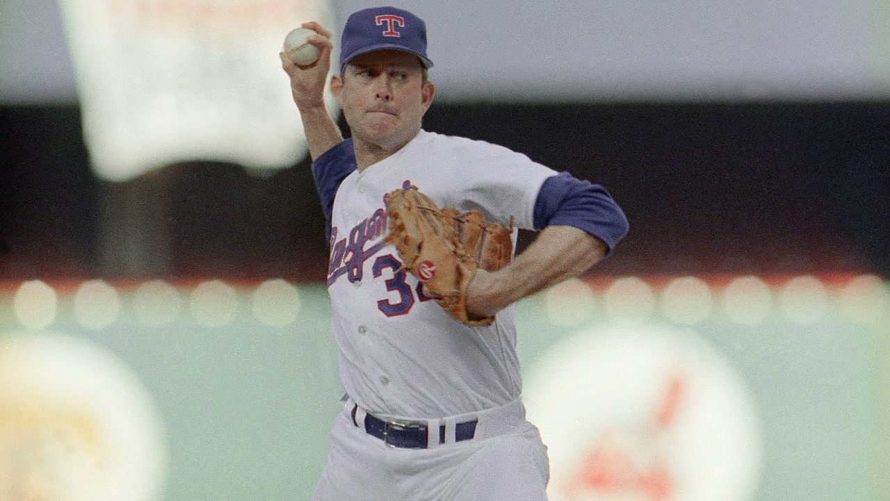 Texas Ranger veteran Nolan Ryan bites down as he fires one of his 35 pitches to the plate on Tuesday night, July 12, 1989 en route to an American League win in the 60th All-Star Game from Anaheim Stadium. AP Photo/Eric Risberg)