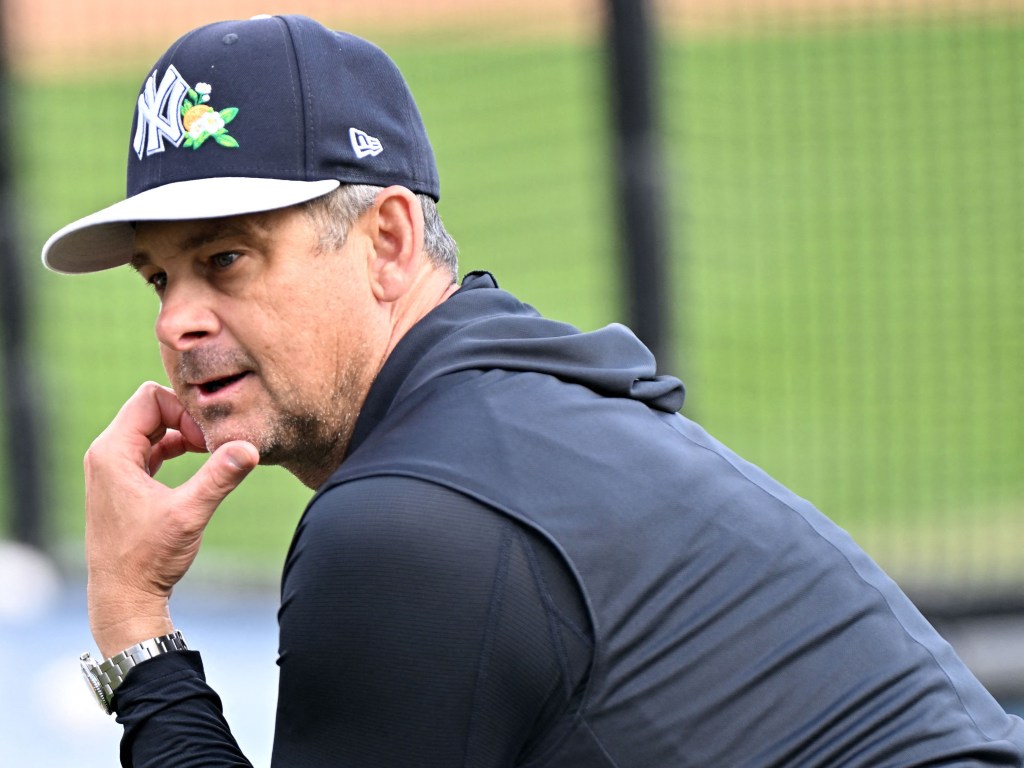 Aaron Boone said the Yankees should be too conservative regarding when to challenge calls and use the automated ball-strike system (ABS).