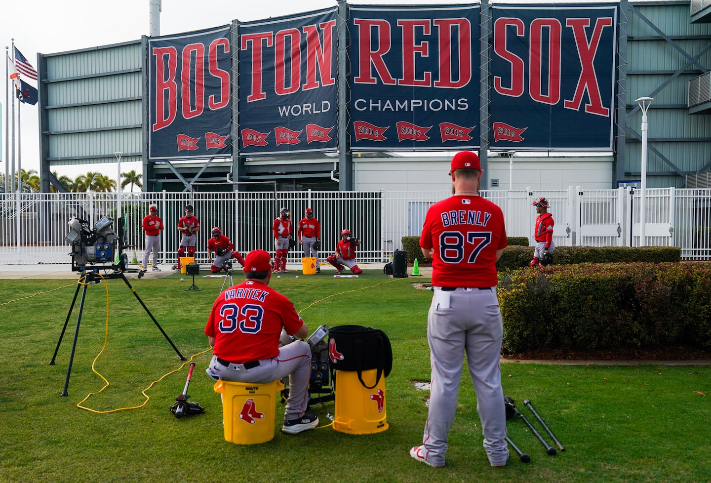 Red Sox coaches Jason Varitek and Mike Bremley will welcome players for the first full-squad workout Sunday.