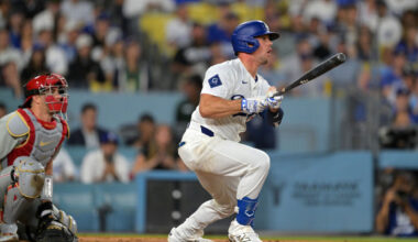 Los Angeles Dodgers catcher Ben Rortvedt (47) hits a RBI single against the Philadelphia Phillies in the second inning at Dodger Stadium.