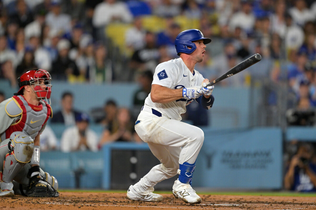 Los Angeles Dodgers catcher Ben Rortvedt (47) hits a RBI single against the Philadelphia Phillies in the second inning at Dodger Stadium.