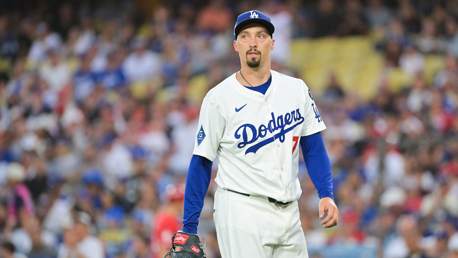 Los Angeles Dodgers starting pitcher Blake Snell (7) walks off the mound during the second inning against the Cincinnati Reds during game one of the Wildcard round for the 2025 MLB playoffs at Dodger Stadium.