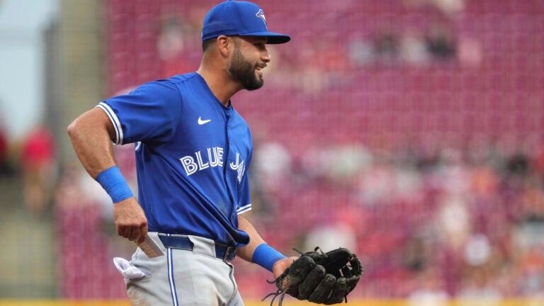 Toronto Blue Jays' Isiah Kiner-Falefa smiles between batters in the second inning of a baseball game against the Cincinnati Reds, Tuesday, Sept. 2, 2025, in Cincinnati.