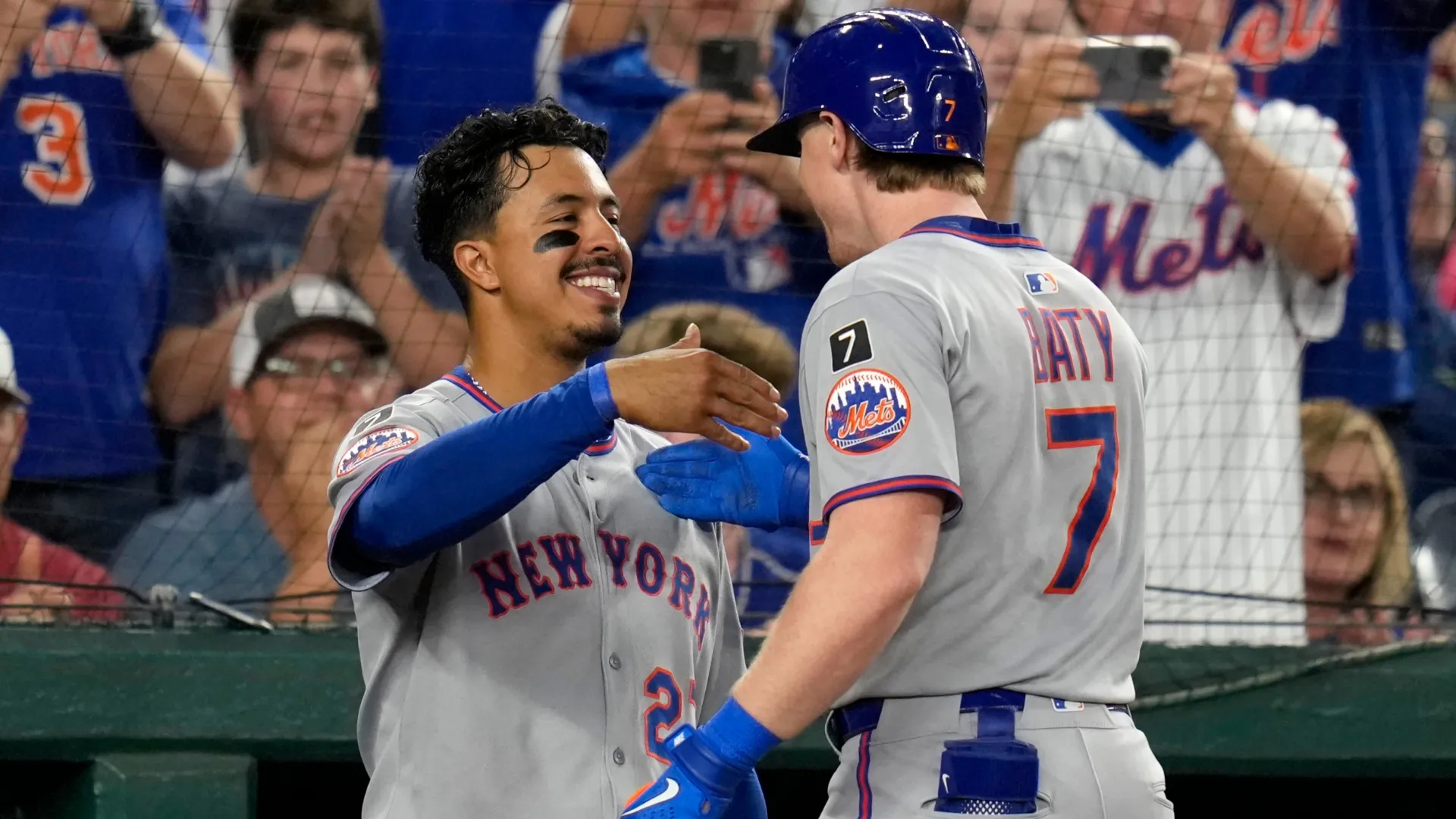 Brett Baty #7 of the New York Mets celebrates his home run with Mark Vientos #27. Jess Rapfogel/Getty Images