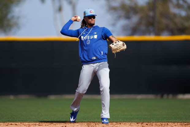 Cubs outfielder Kevin Alcántara throws a ball during fielding drills at spring training on Feb. 18, 2026, at Sloan Park in Mesa, Ariz. (Armando L. Sanchez/Chicago Tribune)