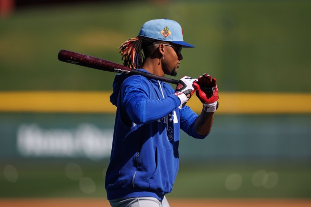 Cubs outfielder Kevin Alcántara stands on the field during batting practice at spring training at Sloan Park on Feb. 19, 2026, in Mesa, Ariz. (Armando L. Sanchez/Chicago Tribune)