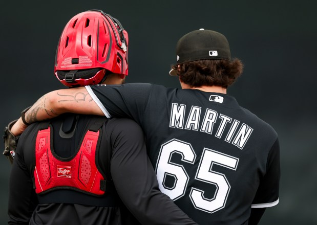 White Sox starter Davis Martin celebrates with catcher Edgar Quero after throwing in the bullpen during spring training at Camelback Ranch on Feb. 18, 2026, in Glendale, Ariz. (Eileen T. Meslar/Chicago Tribune)