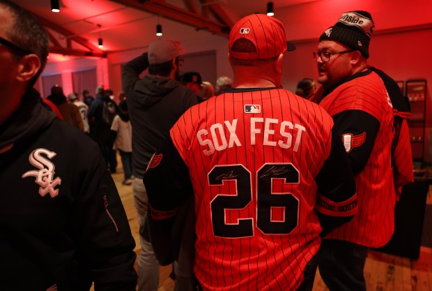 A Chicago White Sox fan wearing a SoxFest jersey waits in line for autographs while attending SoxFest at the Ramova Theatre in Chicago's Bridgeport neighborhood on Friday, Jan. 30, 2026. (Chris Sweda/Chicago Tribune)