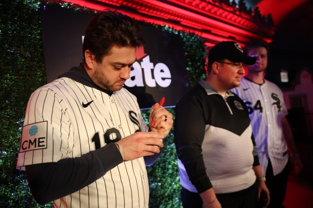 White Sox pitcher Anthony Kay signs an autograph for a fan during SoxFest Live at the Ramova Theatre on Friday, Jan. 30, 2026, in Bridgeport. (Chris Sweda/Chicago Tribune)