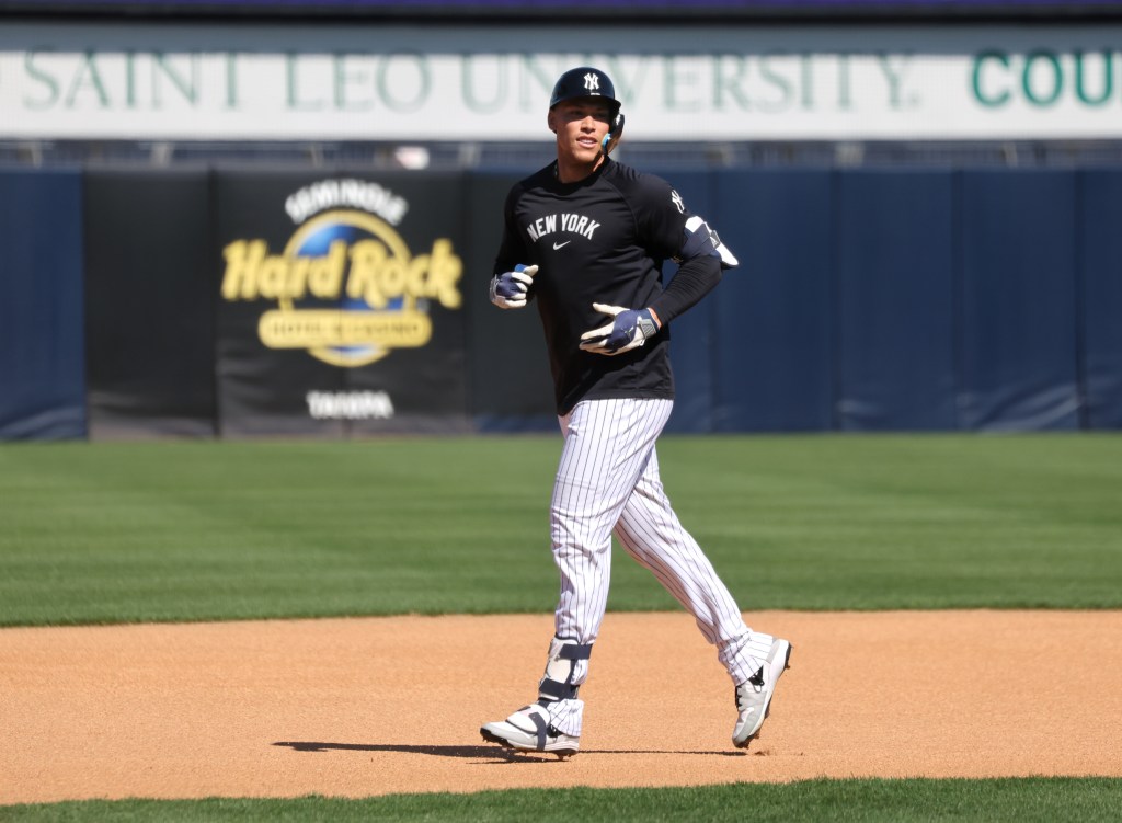 New York Yankees right fielder Aaron Judge #99, jogging around the bases during practice at Steinbrenner Field, the Yankees Spring Training home in Tampa, Florida.