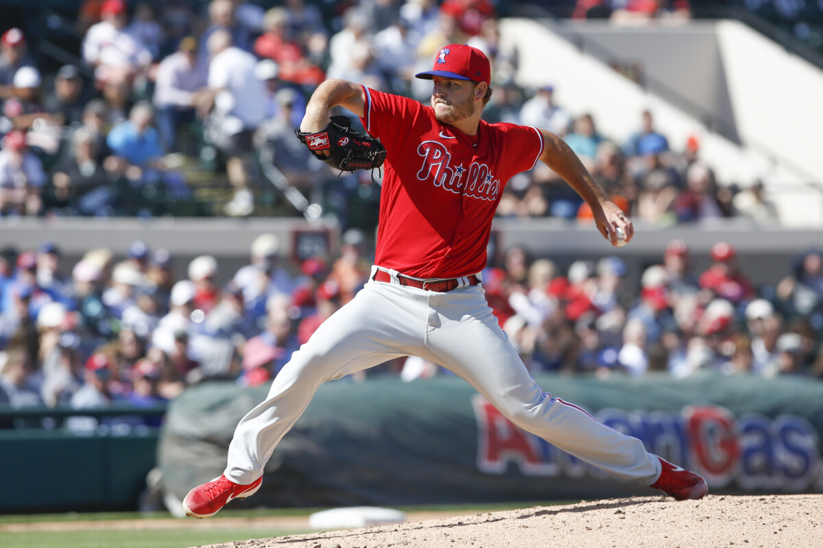 Former Philadelphia Phillies pitcher Cole Irvin pitching in 2020 spring training.